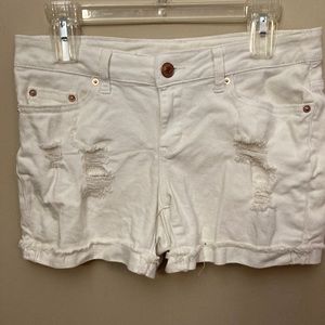 white ripped jean shorts
